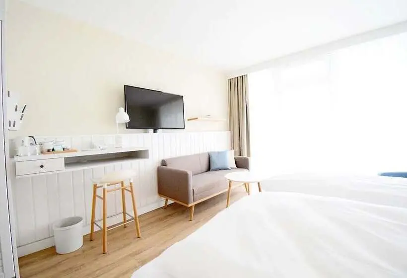 اتاق اجرایی با چشم‌انداز دریا, Wyn. Strandhotel Sylt