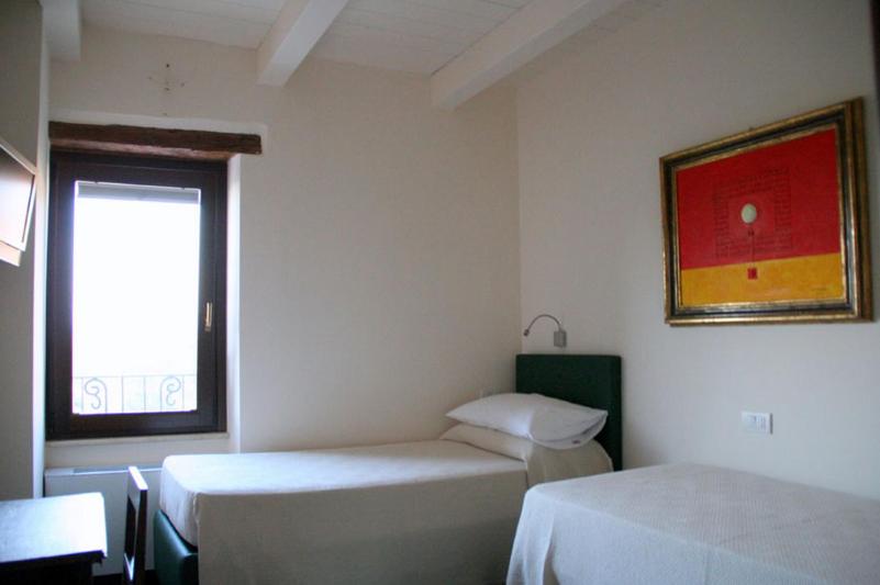 غرفة قياسية رباعية, La Tana Dei Leoni