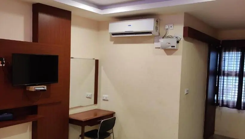 Chambre Deluxe, Kumaran Millenium Residency