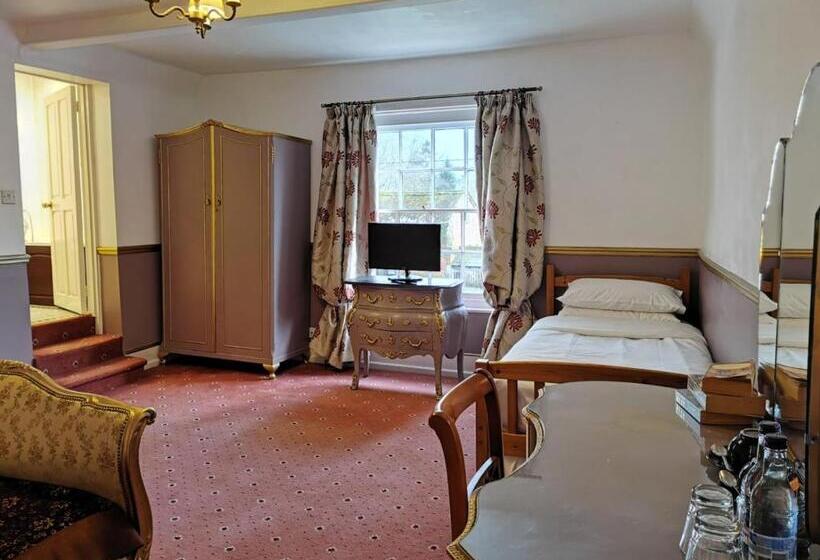 סוויטה משפחתית, The Compasses Inn