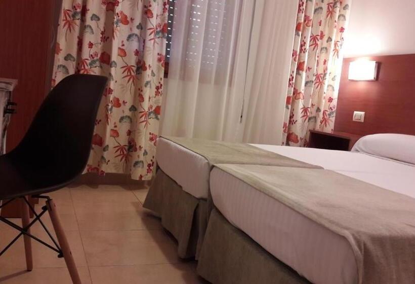 经济房, Torres Touriño