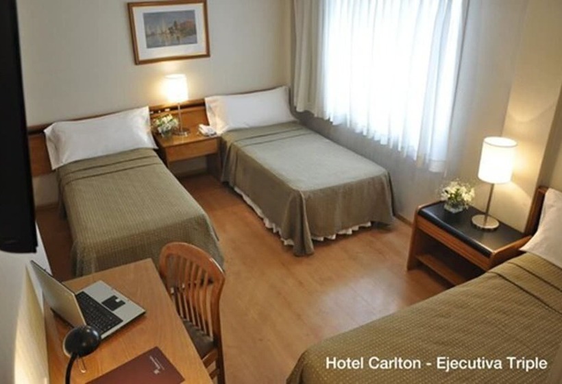 חדר אקזקיוטיב לשלושה, Solans Carlton