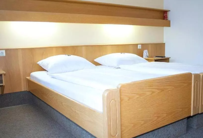 Chambre Economy Individuelle, Am Regenbogen