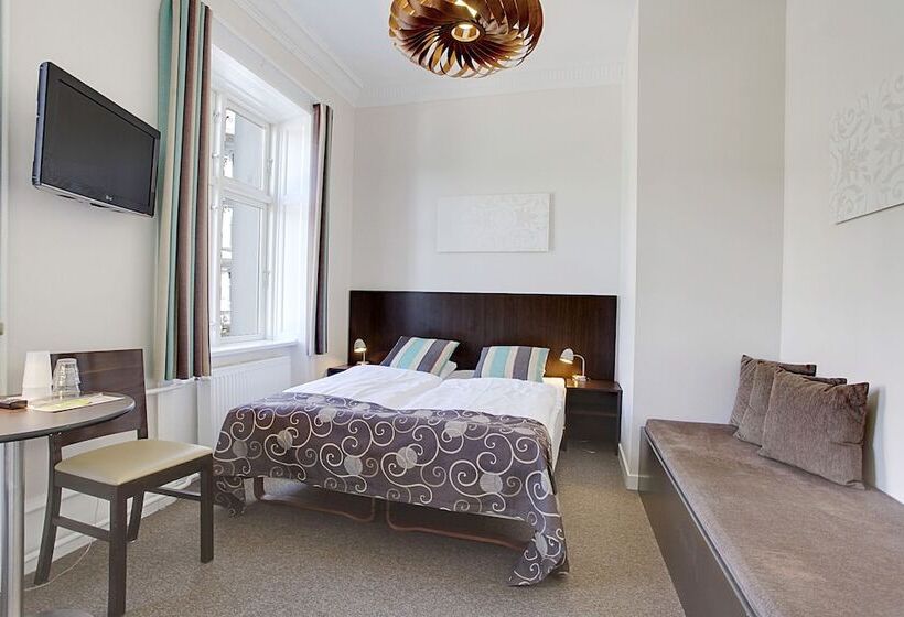 Номер Стандарт, Sct. Thomas