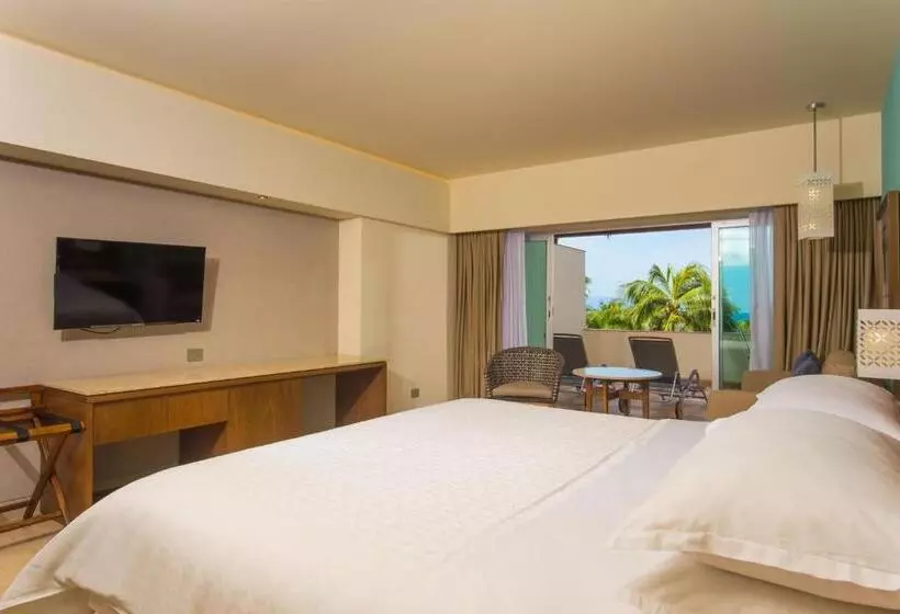 キングサイズベッドのスタンダードルーム, Sheraton Buganvilias Resort & Convention Center