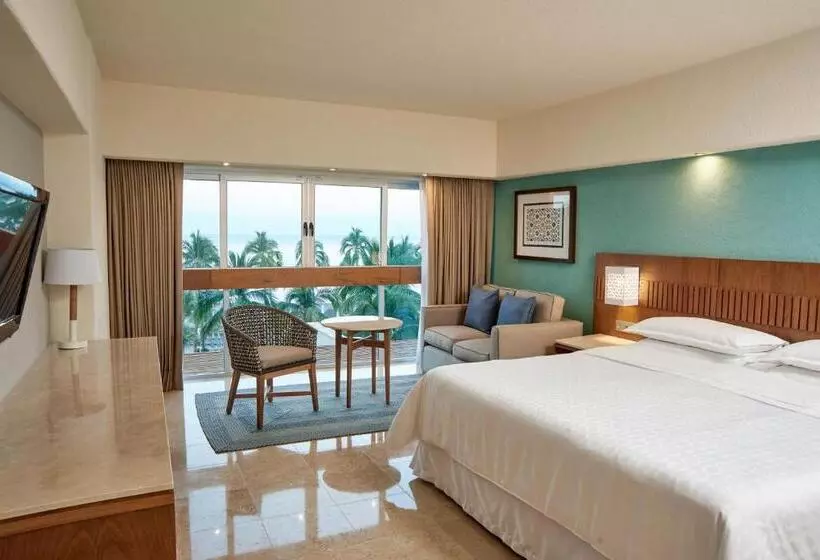 キングサイズベッドのデラックスルーム, Sheraton Buganvilias Resort & Convention Center