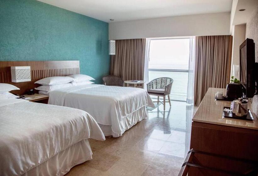 Quarto deluxe vista mar, Sheraton Buganvilias Resort & Convention Center