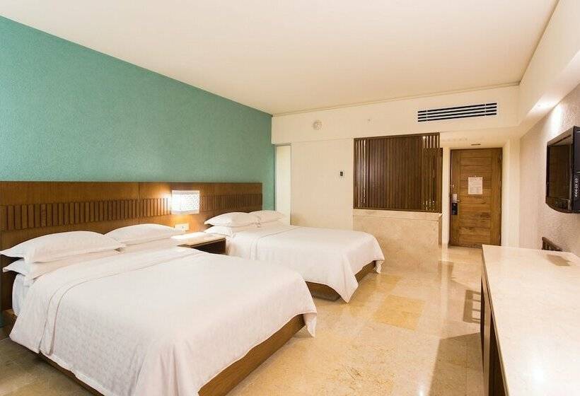 Quarto deluxe vista jardim, Sheraton Buganvilias Resort & Convention Center