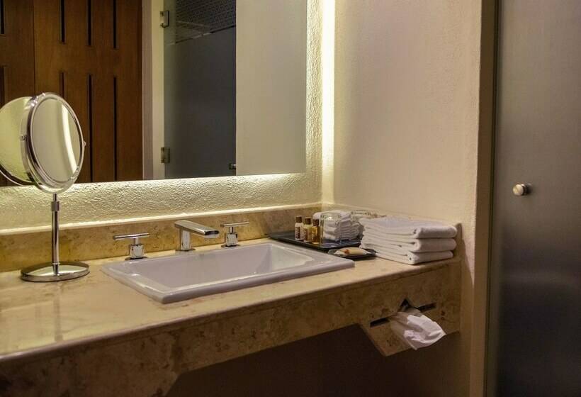 Quarto deluxe vista jardim, Sheraton Buganvilias Resort & Convention Center