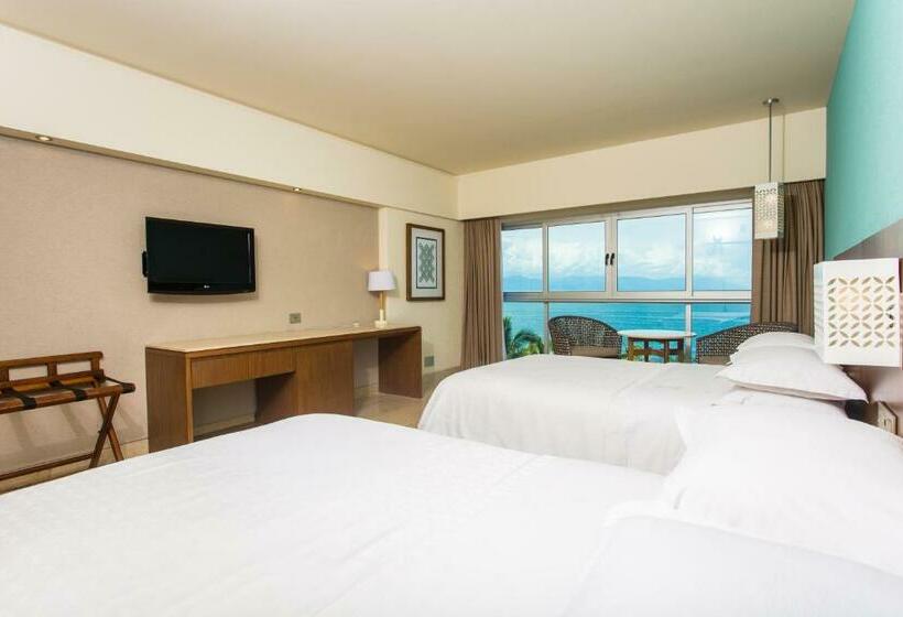 Quarto deluxe vista mar, Sheraton Buganvilias Resort & Convention Center