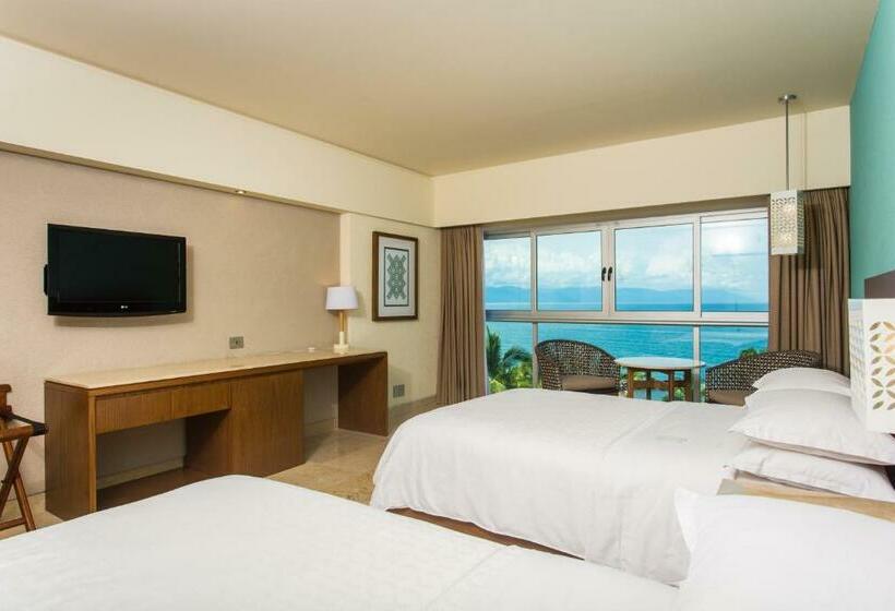 Quarto deluxe vista mar, Sheraton Buganvilias Resort & Convention Center