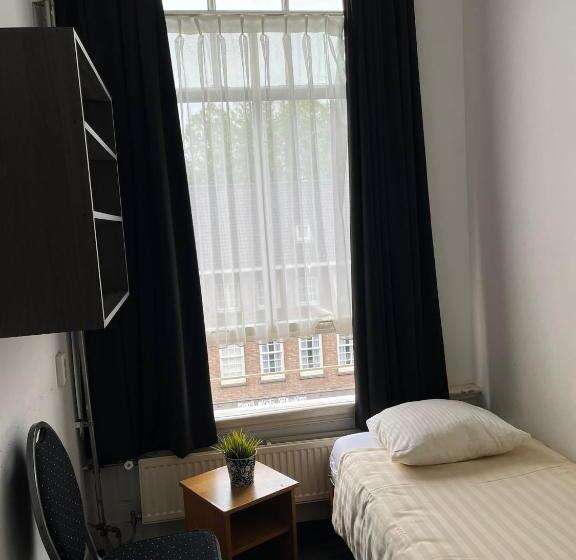 اتاق استاندارد یک تخته با سرویس بهداشتی مشترک, Galerij