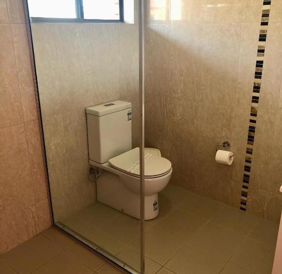 חדר דלוקס לשלושה, Alamo Motor Inn