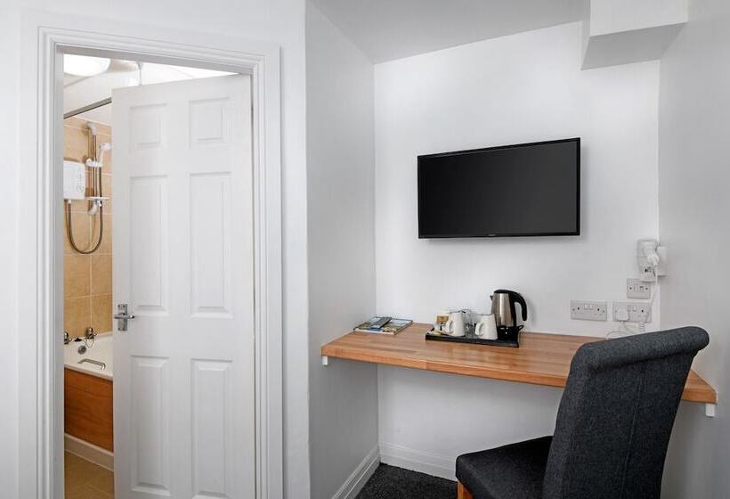 חדר דלוקס, The Corner House