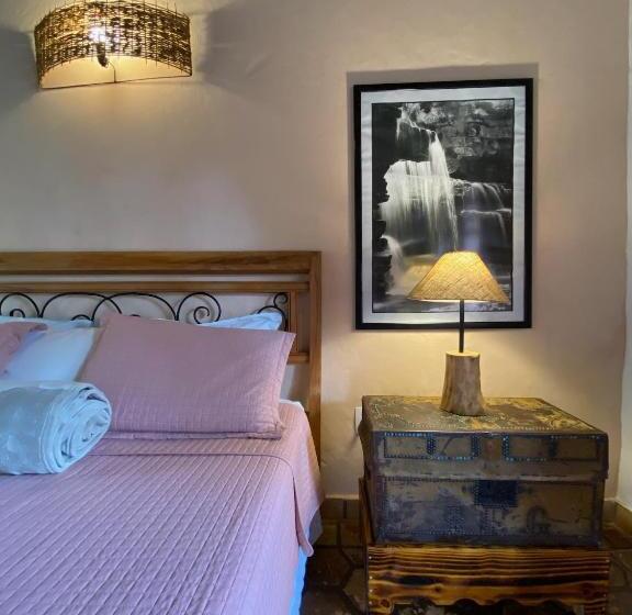 מיטת קינג בסוויטה, Pousada Vila Serrano