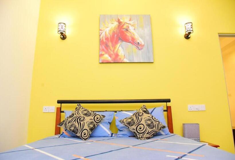 キングサイズベッドのデラックスルーム, White Villa Airport Transit