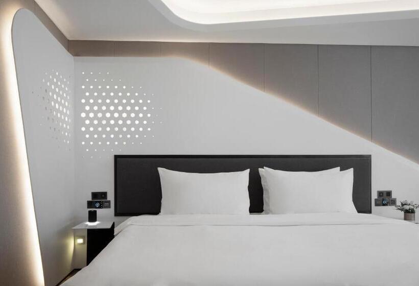 キングサイズベッドのデラックスルーム, Flyzoo Hotel Alibaba Future