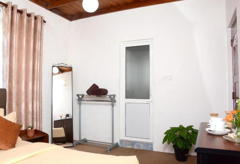 Quarto Deluxe com Sacada, The Fern Inn