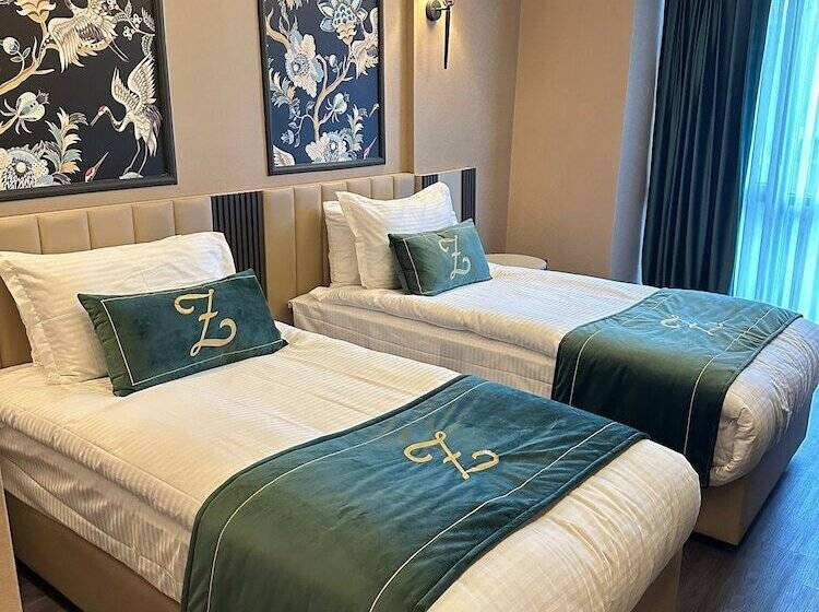 Quarto Triplo Estandar, The New Hotel Zeybek