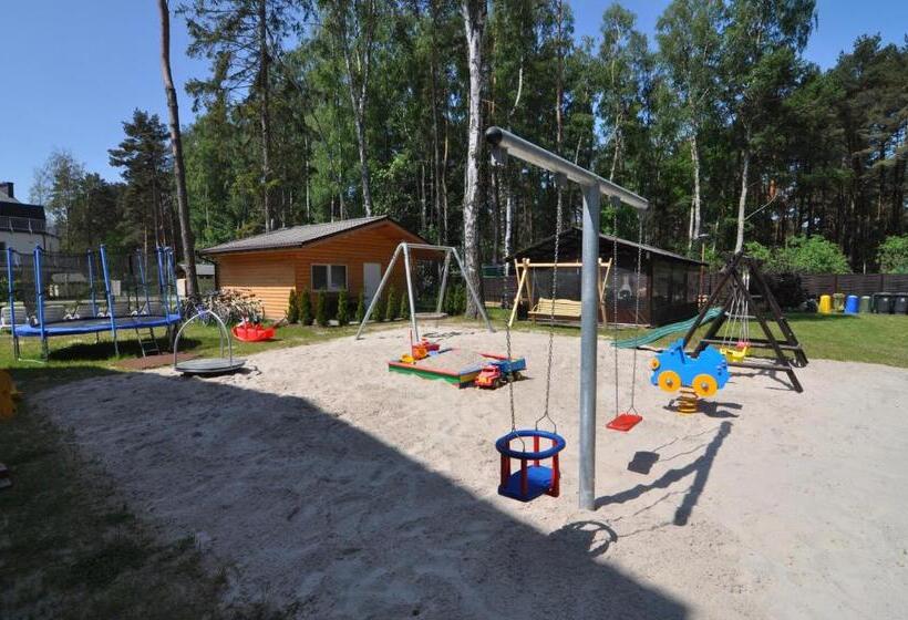 דירת משפחה, Pensjonat Magnolie