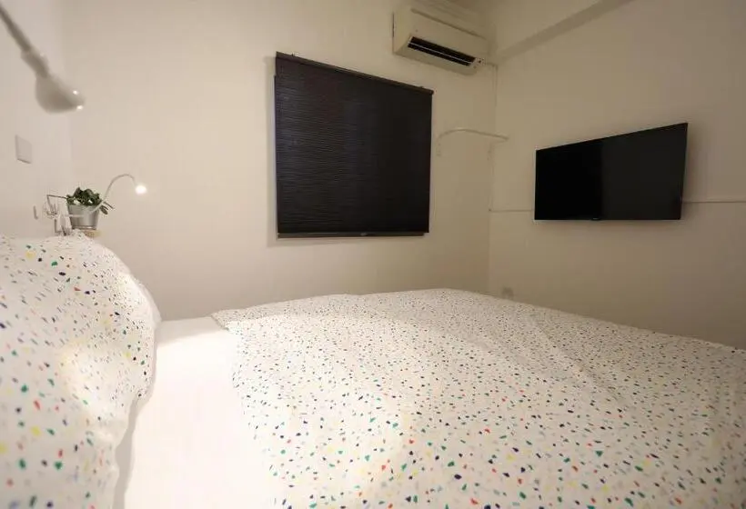اتاق خانوادگی با چشم‌انداز باغ, Dong Shan Yi Hostel