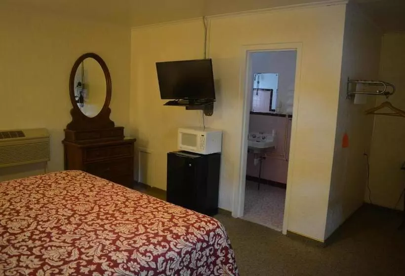 キングサイズベッドのスタンダードルーム, The Evergreen Motel In Kansas