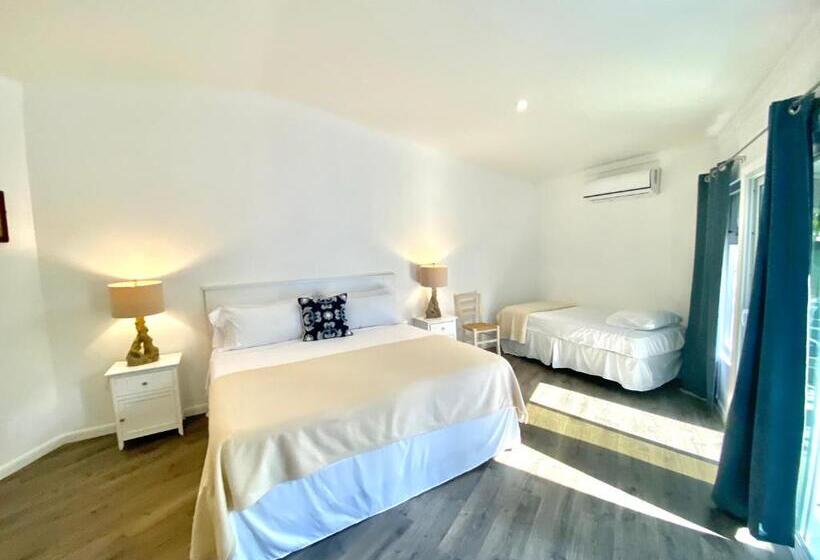 Standard Triple Room Garden View, The Sunset Cove And Rainbow Room