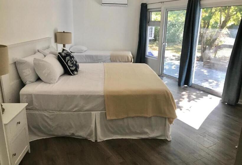 Standard Triple Room Garden View, The Sunset Cove And Rainbow Room