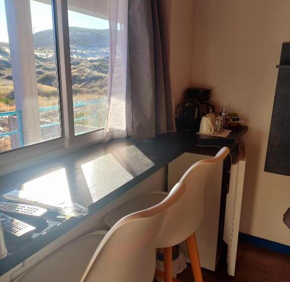 غرفة ديلوكس, Raíces