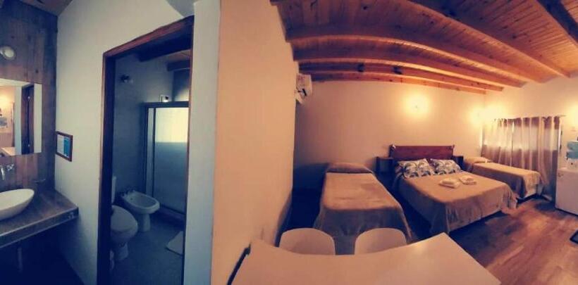 غرفة ديلوكس رباعية, Raíces