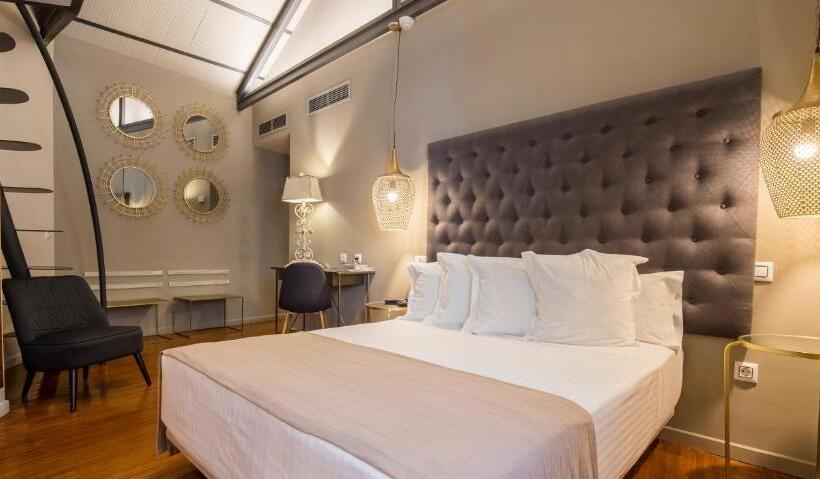 高级大房间, Abad Toledo