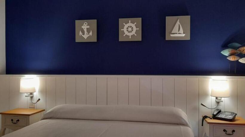 חדר משפחתי דלוקס, Garbi