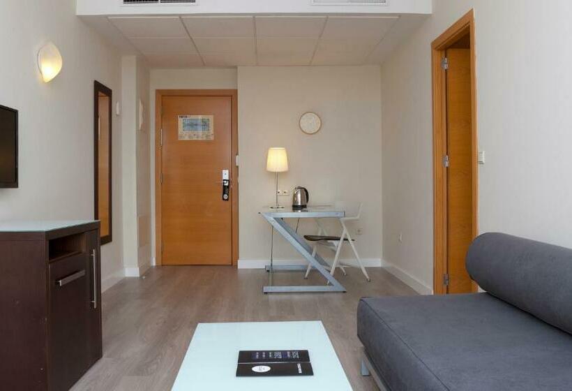 سوییت جونیور, Vertice Sevilla