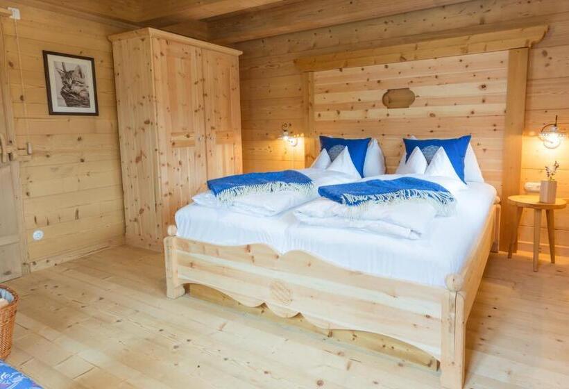 בקתת סופריור בת חדר 1, Almdorf Seinerzeit