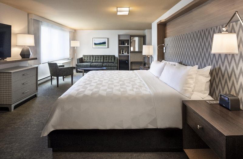 キングサイズベッドのエクゼクティブルーム, Holiday Inn Montreal Longueuil, An Ihg