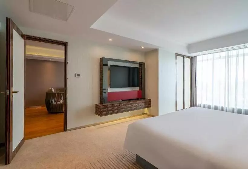 キングサイズベッドのスイートルーム, Suning Universal Hotel All Suites