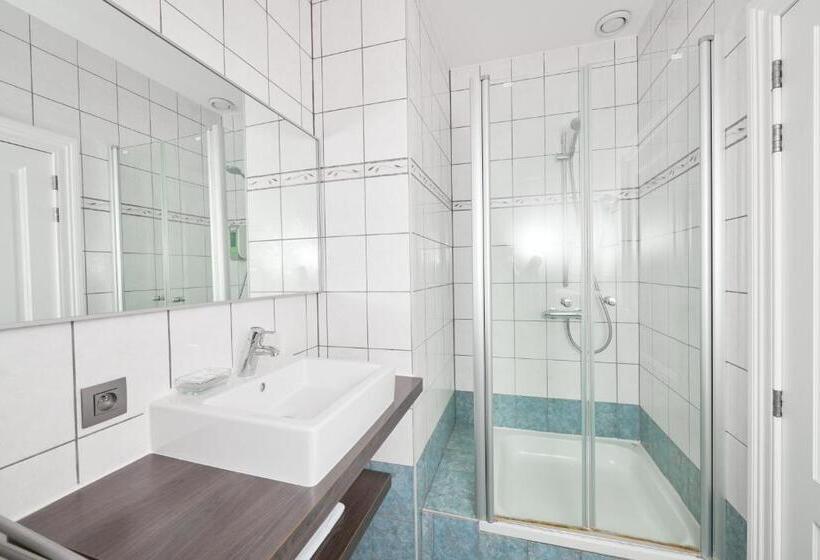 Номер Стандарт, De Statie