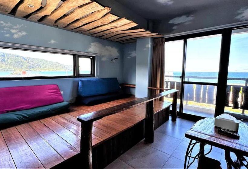 اتاق استاندارد چهار تخته با چشم‌انداز دریا, 墾丁興海灣民宿