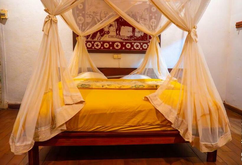 بانگلوی استاندارد, Olympe De Bemaraha