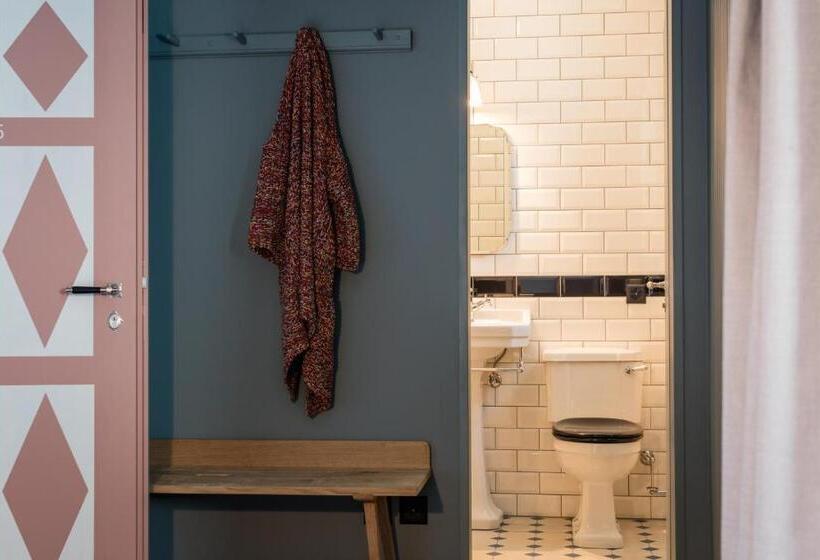Номер Deluxe, De Londres