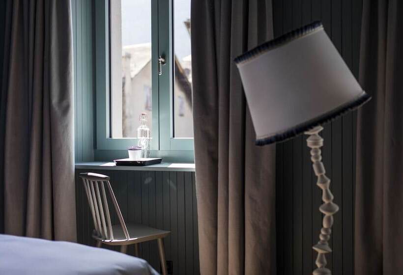 Номер Deluxe, De Londres