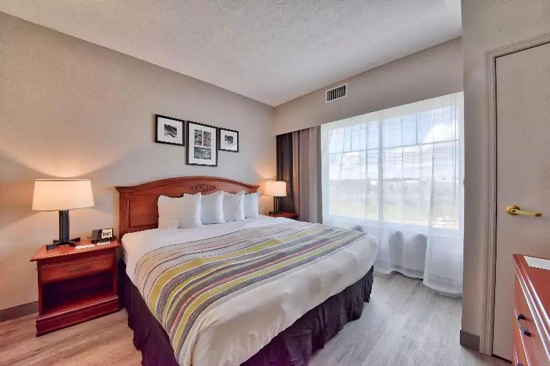 キングサイズベッドのスタンダードルーム, Country Inn & Suites By Radisson Ocala Southwest