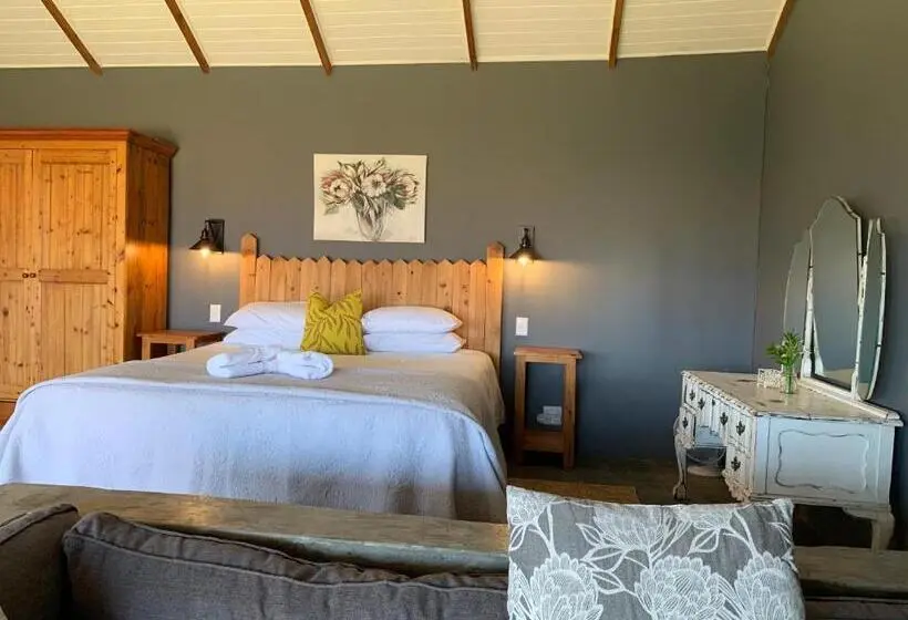 キングサイズベッドのデラックスルーム, Berghouse And Cottages