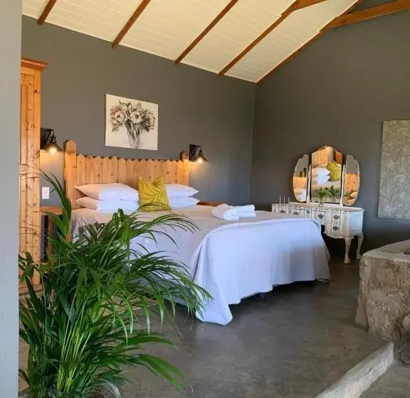 キングサイズベッドのデラックスルーム, Berghouse And Cottages