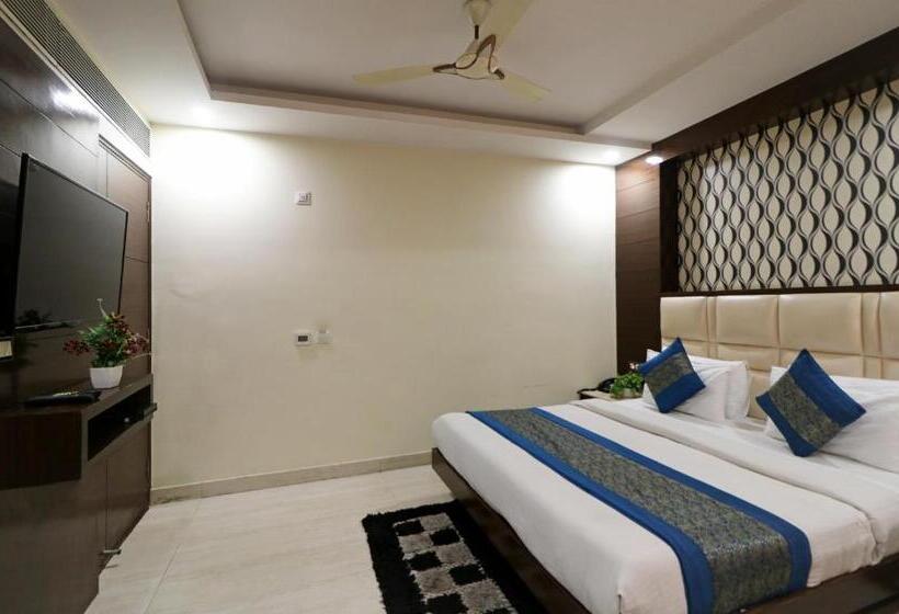 キングサイズベッドのデラックスルーム, Mannat International By Mannat