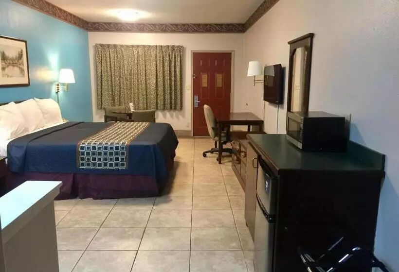 キングサイズベッドのデラックスルーム, Texas Inn And Suites City Center At University Dr