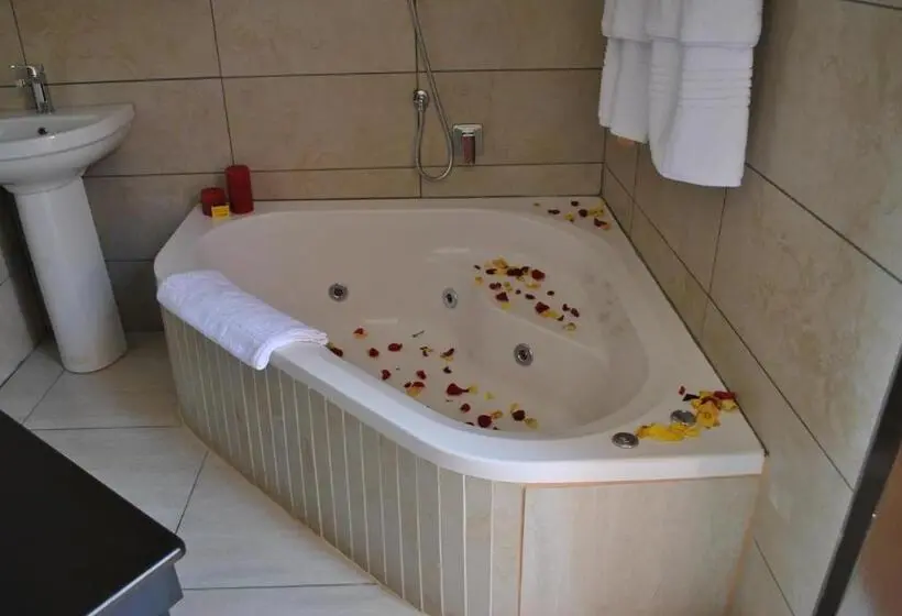 キングサイズベッドのデラックスルーム, Amaris Guesthouse