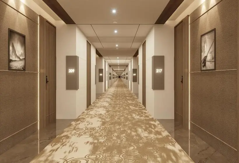 キングサイズベッドのデラックスルーム, Sarovar Portico Morbi