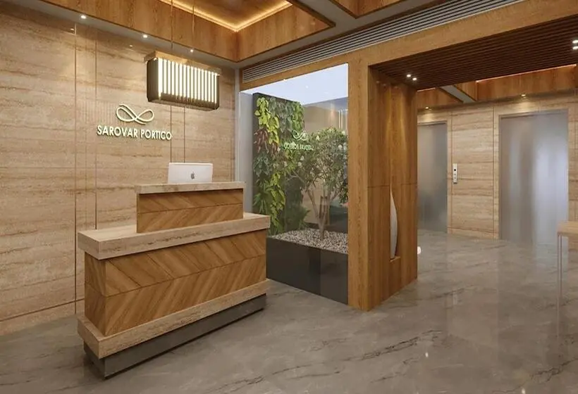 キングサイズベッドのデラックスルーム, Sarovar Portico Morbi