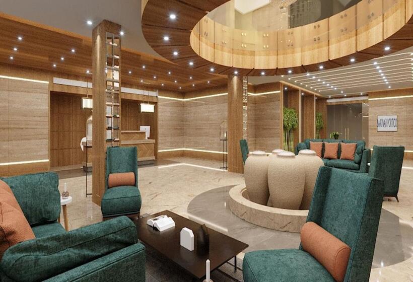 חדר דחוקס עם מיטת קינג, Sarovar Portico Morbi